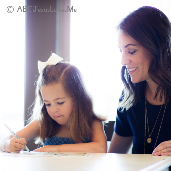 Daughter and mom doing school